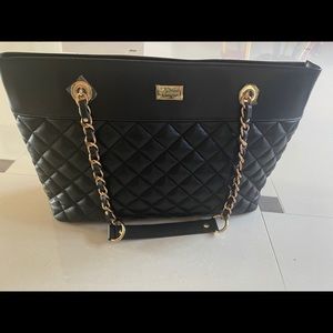Brand new St.John quilted leather tote bag